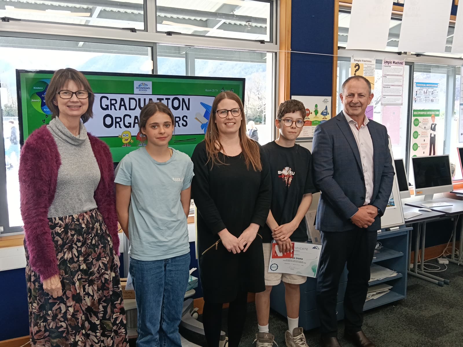 Arrowtown School students and adults gathered for a prize presentation